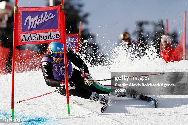 Davide Simoncelli of Italy competes during the Audi FIS Alpine Ski World Cup Men's Giant Slalom on January 11, 2014 in Adelboden, Switzerland.