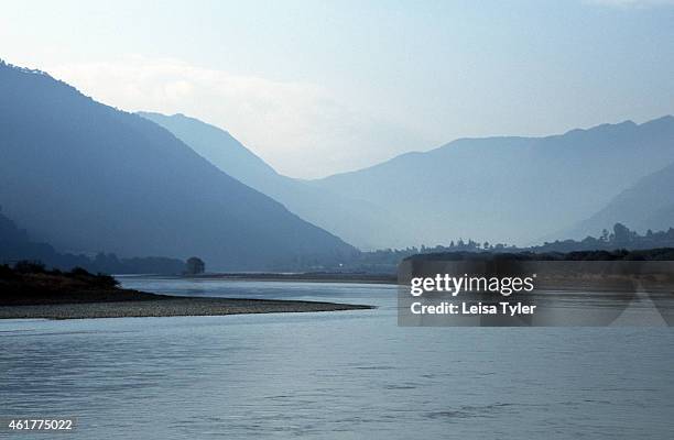 The first bend of the Yangtze River. The river is set to flood with a big dam planned for Tiger Leaping Gorge located above the first bend. One of...