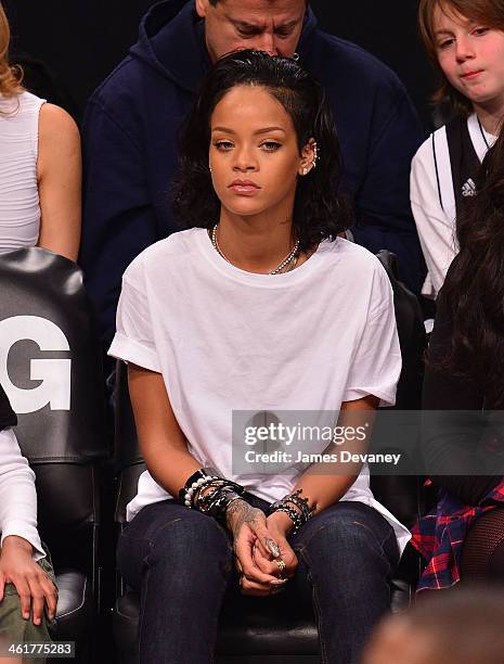Rihanna attends the Miami Heat vs Brooklyn Nets game at Barclays Center on January 10, 2014 in the Brooklyn borough of New York City.