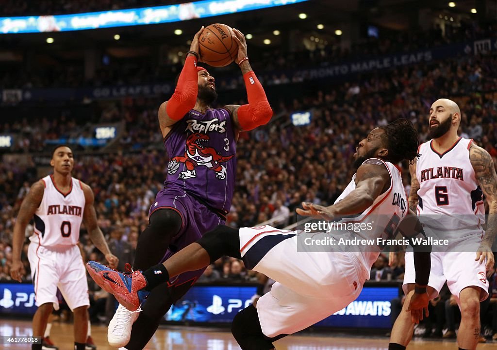 Raptors Johnson offensive foul against Hawks Carroll