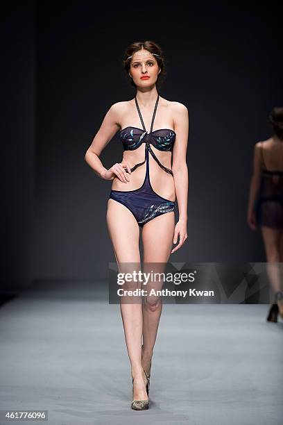 Model showcases designs by student of The Hong Kong Polytechnic University on the runway during the PolyU Intimate Fashion Show on day 1 of Hong Kong...