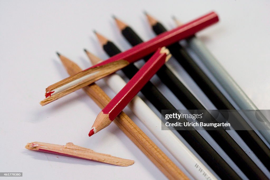 Multicolored Pencils And A Broken Red Pen On The Topic Censorship.