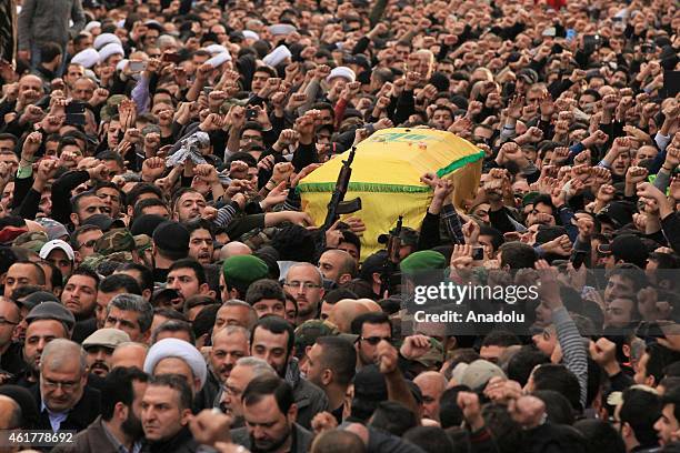 Lebanese Hezbollah supporters carry the coffin of Jihad Mughniyeh, son of Hezbollah's commander Imad Mughniyah and killed by Israeli air strike on...