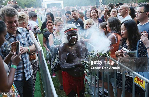 An Aborginal elder performs a smoking ceremony prior to Chaka Khan's live performance at Sydney Festival 2014 at The Domain on January 11, 2014 in...