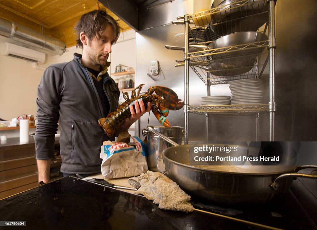 Chef prepares lobster