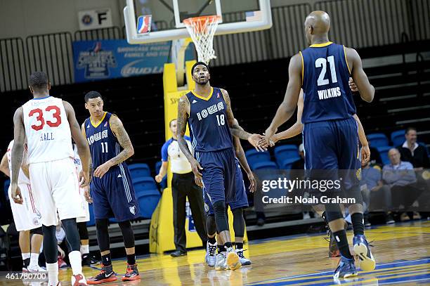 Tyrus Thomas, Damien Wilkins and Dante Garrett of the Iowa Energy celebrate against the Delaware 87ers during the 2015 NBA D-League Showcase...