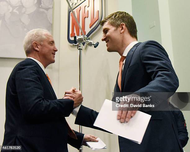 The Chicago Bears new head coach John Fox is greeted by Chicago Bears general manager Ryan Pace at a press conference on January 19, 2015 at Halas...