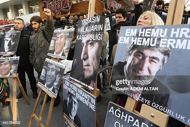 People take part in a demonstration calling for justice over the murder of Turkish-Armenian journalist Hrant Dink on January 19, 2015 in Ankara. Dink...