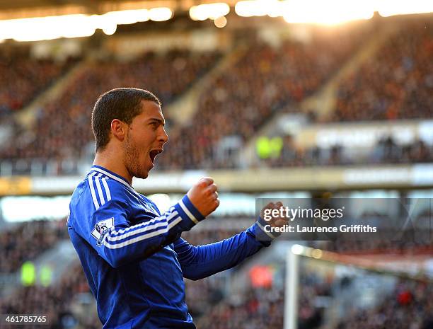 Eden Hazard of Chelsea celebrates scoring their first goal during the Barclays Premier League match between Hull City and Chelsea at KC Stadium on...