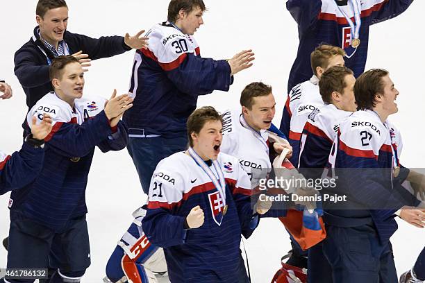 Team Slovakia celebrates after winning the Bronze medal game against Sweden in the 2015 IIHF World Junior Championship on January 05, 2015 at the Air...