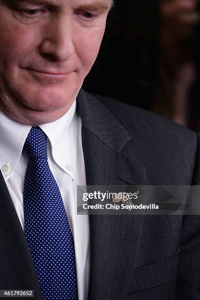 Rep. Chris Van Hollen wears a lapel pin with both the U.S. Flag and the Cuba flag during a news conference at the Hotel Saratoga January 19, 2015 in...