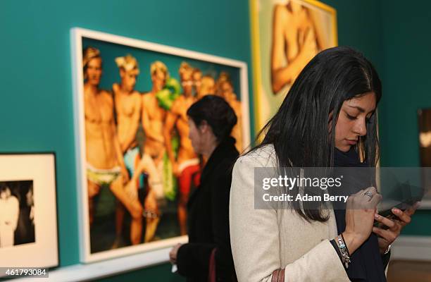 Visitor attends the 'Mario Testino: In Your Face' private view vernissage at Kunstbibliothek on January 19, 2015 in Berlin, Germany.