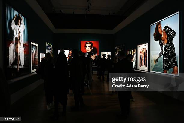 Visitors attend the 'Mario Testino: In Your Face' private view vernissage at Kunstbibliothek on January 19, 2015 in Berlin, Germany.