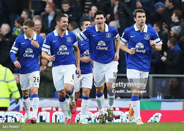 Gareth Barry of Everton celebrates his goal with Phil Jagielka during the Barclays Premier League match between Everton and Norwich City at Goodison...