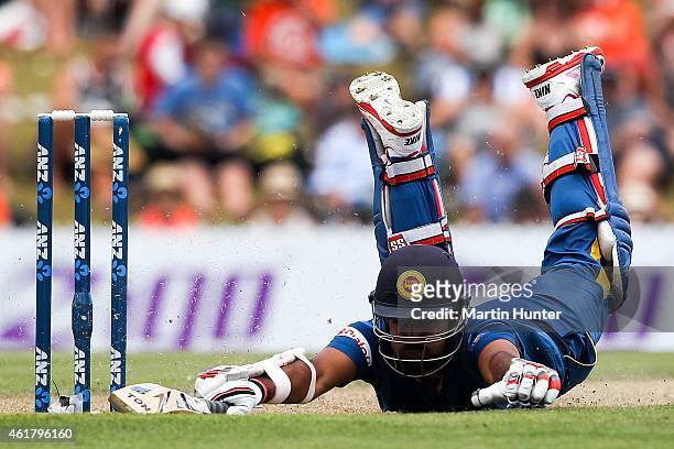 Lahiru Thirimanne of Sri Lanka dives to make his ground during the One Day International match between New Zealand and Sri Lanka at Saxton Field on...
