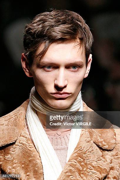 Model walks the runway during the Gucci show as part of Milan Menswear Fashion Week Fall Winter 2015/2016 on January 19, 2015 in Milan, Italy.