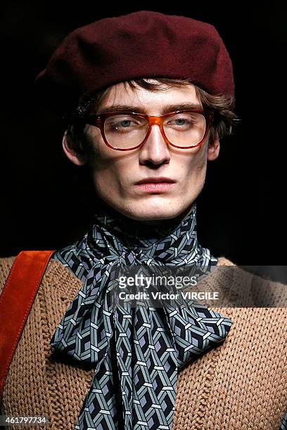Model walks the runway during the Gucci show as part of Milan Menswear Fashion Week Fall Winter 2015/2016 on January 19, 2015 in Milan, Italy.