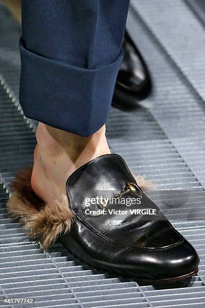 Model walks the runway during the Gucci show as part of Milan Menswear Fashion Week Fall Winter 2015/2016 on January 19, 2015 in Milan, Italy.