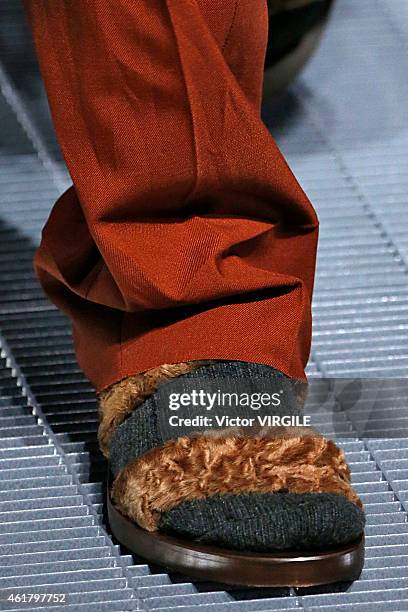 Model walks the runway during the Gucci show as part of Milan Menswear Fashion Week Fall Winter 2015/2016 on January 19, 2015 in Milan, Italy.