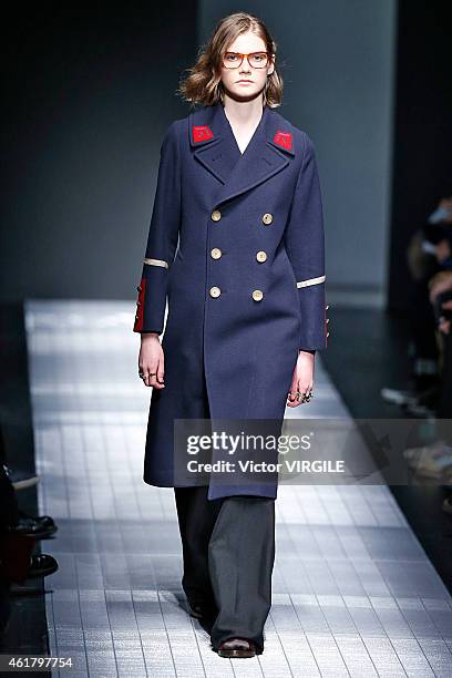 Model walks the runway during the Gucci show as part of Milan Menswear Fashion Week Fall Winter 2015/2016 on January 19, 2015 in Milan, Italy.