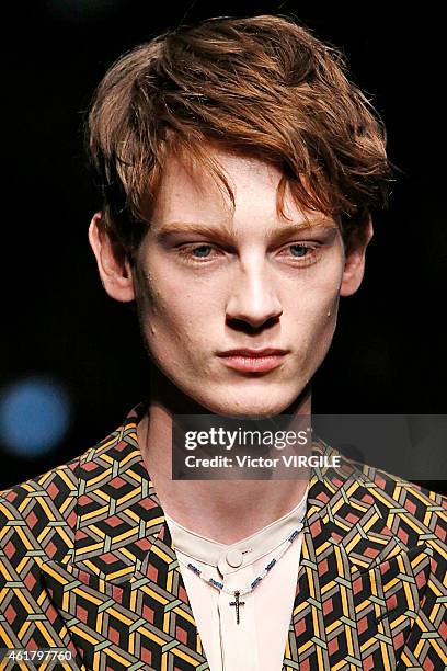 Model walks the runway during the Gucci show as part of Milan Menswear Fashion Week Fall Winter 2015/2016 on January 19, 2015 in Milan, Italy.