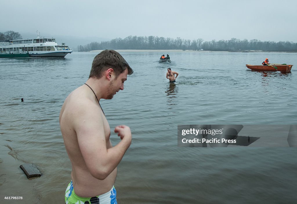 An Orthodox  prepares to dip into the icy water of a Dnieper...