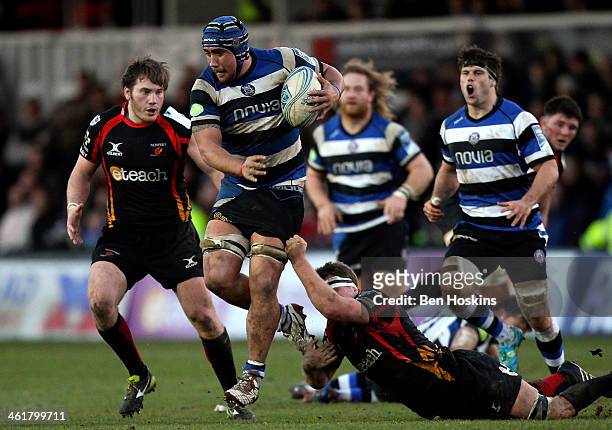Leroy Houston of Bath makes a break during the Amlin Challenge Cup match between Newport Gwent Dragons and Bath at Rodney Parade on January 11, 2014...