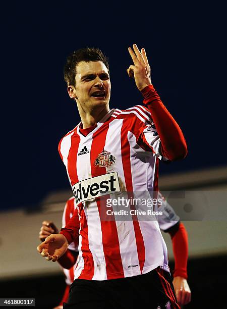Adam Johnson of Sunderland celebrates scoring a hat trick during the Barclays Premier League match between Fulham and Sunderland at Craven Cottage on...