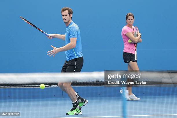Andy Murray of Great Britain in a practice session as new coach Amelie Mauresmo watches on during day two of the 2015 Australian Open at Melbourne...