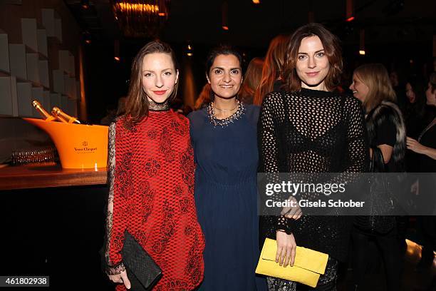 Katharina Schuettler, designer Leyla Piedayesh, and Antje Traue attend the LaLa Berlin Dinner with Cinderella during the Mercedes-Benz Fashion Week...