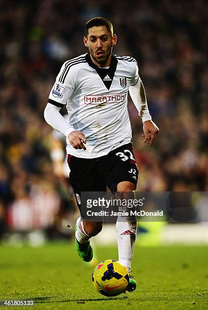 Clint Dempsey of Fulham runs with the ball during the Barclays Premier League match between Fulham and Sunderland at Craven Cottage on January 11,...