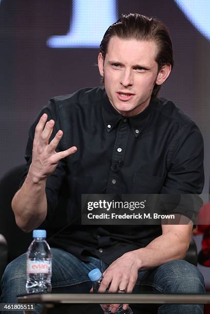 Actor Jamie Bell speaks onstage during the 'AMC - Turn' panel discussion at the AMC/Sundance portion of the 2014 Winter Television Critics...