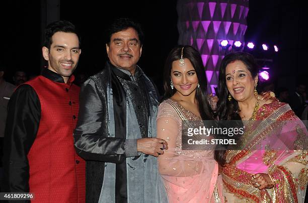 Indian Bollywood veteran actor Shatrughan Sinha with his wife Poonam , pose with their children, daughter Sonakshi Sinha and son Luv during the...