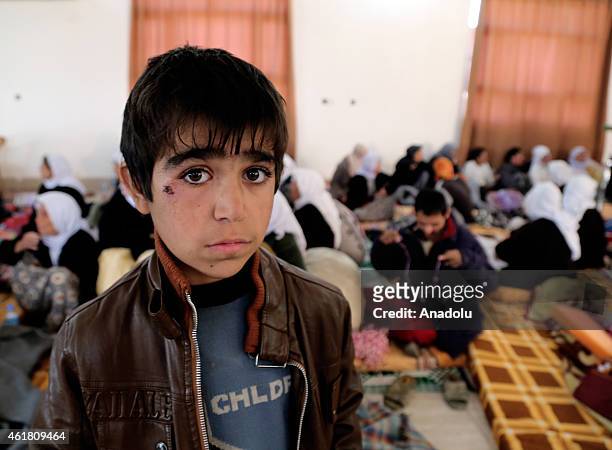Yazidi kid 8-year old Murat Hidir freed by Islamic State of Iraq and the Levant militants are seen in Kirkuk, Iraq on January 18, 2015. ISIL freed...