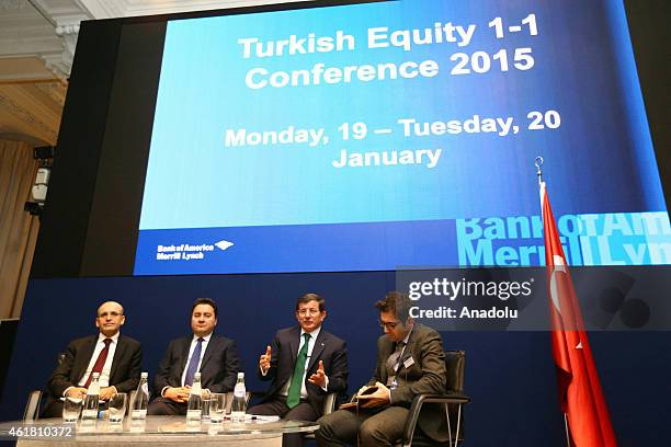 Turkish Prime Minister Ahmet Davutoglu , Turkish deputy Prime Minister Ali Babacan and Turkish Finance Minister Mehmet Simsek attend the Bank of...