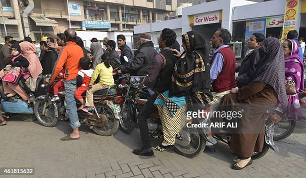 Pakistani motorists queue at a petrol station in Lahore on January 20, 2015. Pakistani Prime Minister Nawaz Sharif on January 20, expressed extreme...