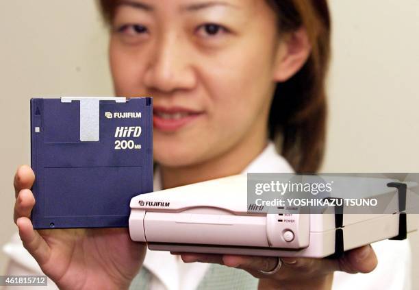 Japan's Fujifilm unveils 200MB capacity 3.5" floppy disk HiFD and its HDR200PRDSA drive, developed by Fujifilm and Sony, at the company's office in...