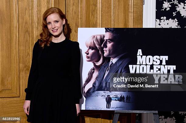 Jessica Chastain poses at a photocall for "A Most Violent Year" at The Soho Hotel on January 20, 2015 in London, England.