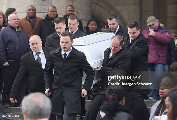 The coffin of soccer player Junior Malanda is carried at Basilica of the Sacred Heart on January 20, 2015 in Brussels, Belgium. The 20-year-old...