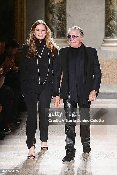 Designer Roberto Cavalli and Eva Cavalli acknowledges the applause of the public after the Roberto Cavalli show as a part of Milan Menswear Fashion...