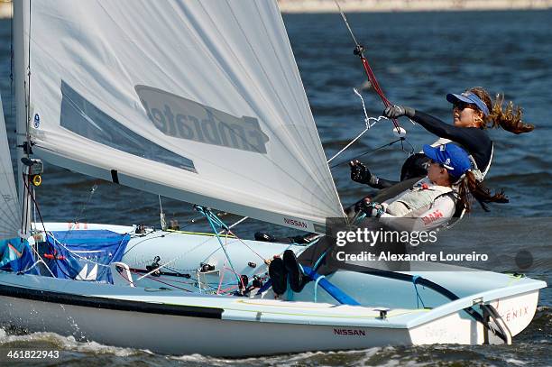 Isabel Swan and Renata Decnop sail on Sao Francisco beach for the Brazil Sail Cup 2014 on January 11, 2014 in Rio de Janeiro, Brazil.