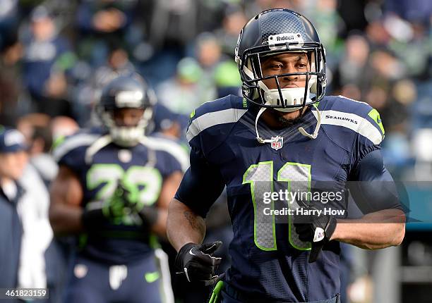 Wide receiver Percy Harvin of the Seattle Seahawks on the field before taking on the New Orleans Saints on the field during the NFC Divisional...