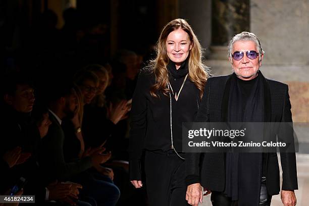 Designer Roberto Cavalli and Eva Cavalli acknowledges the applause of the public after the Roberto Cavalli show as a part of Milan Menswear Fashion...