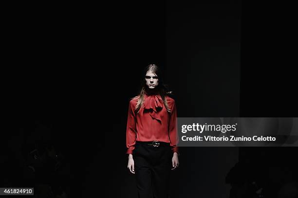 Model wals the runway during the Gucci Show as part of Milan Menswear Fashion Week Fall Winter 2015/2016 on January 19, 2015 in Milan, Italy.