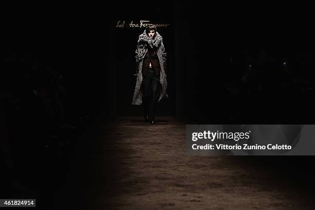 Model walks the runway during the Ferragamo Show as a part of Milan Menswear Fashion Week Fall Winter 2015/2016 on January 18, 2015 in Milan, Italy.