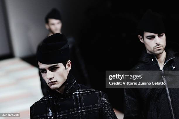 Models walk the runway during the Emporio Armani Show as part of Milan Menswear Fashion Week Fall Winter 2015/2016 on January 19, 2015 in Milan,...