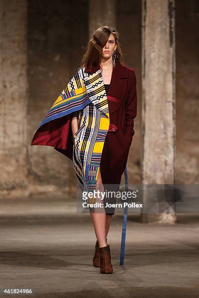 Model walks the runway at the Bobby Kolade show during the Mercedes-Benz Fashion Week Berlin Autumn/Winter 2015/16 at Halle am Berghain on January...