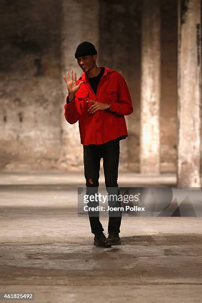 Designer Bobby Kolade attends his runway show during the Mercedes-Benz Fashion Week Berlin Autumn/Winter 2015/16 at Halle am Berghain on January 20,...