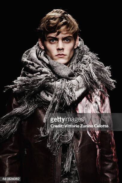 Model walks the runway during the Ferragamo Show as a part of Milan Menswear Fashion Week Fall Winter 2015/2016 on January 18, 2015 in Milan, Italy.