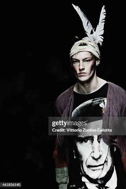 Model walks the runway during the Vivienne Westwood Show as a part of Milan Menswear Fashion Week Fall Winter 2015/2016 on January 18, 2015 in Milan,...